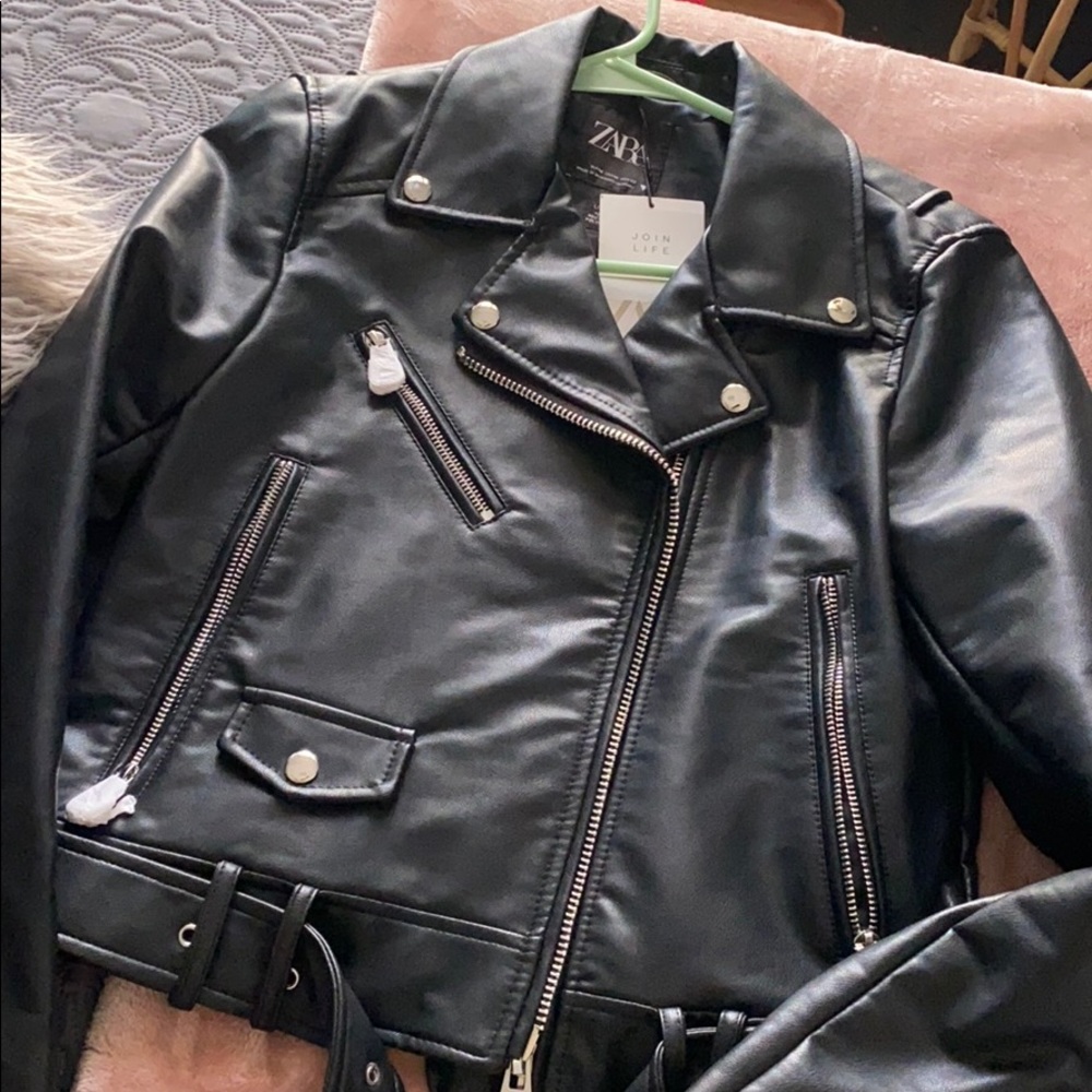 Leather jacket with belt and zipper detail